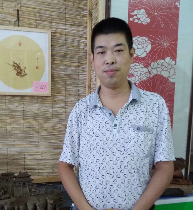 张建民（烙画）